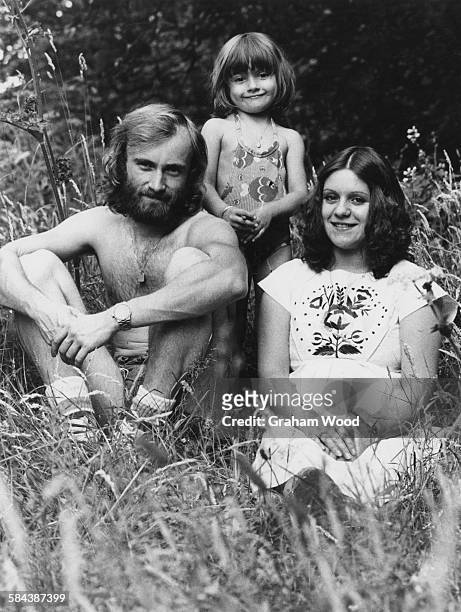 English singer-songwriter and drummer with rock group, Genesis, Phil Collins, with his first wife, Andrea Bertorelli, and her four year-old daughter,...