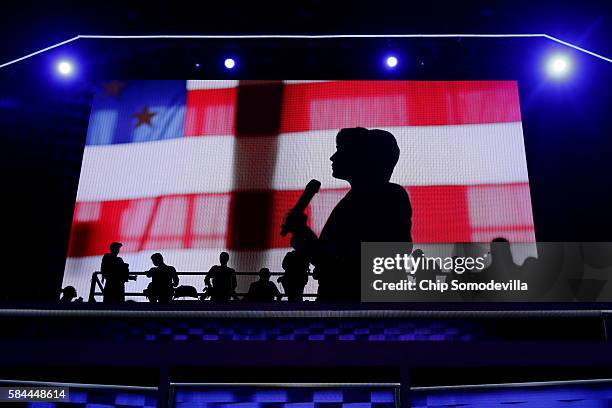 Video displays an introduction to Democratic presidential candidate Hillary Clinton on the fourth day of the Democratic National Convention at the...