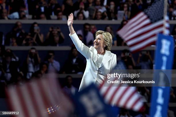 Democratic presidential candidate Hillary Clinton acknowledges the crowd as she arrives on stage during the fourth day of the Democratic National...
