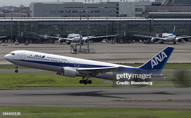 An All Nippon Airways Co. Aircraft takes off at Haneda Airport in Tokyo, Japan, on Thursday, July 28, 2016. ANA is scheduled to release full-year...