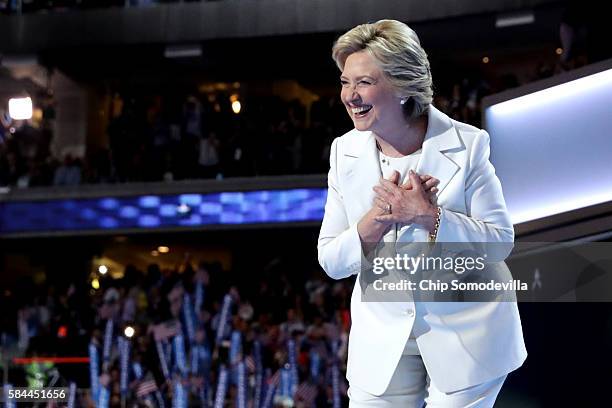 Democratic presidential candidate Hillary Clinton acknowledges the crowd at the end on the fourth day of the Democratic National Convention at the...