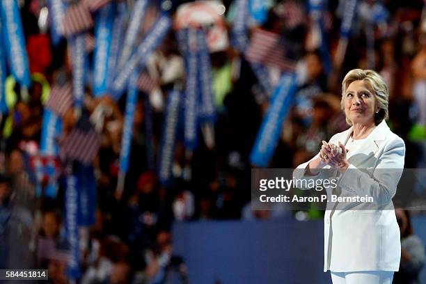 Democratic presidential candidate Hillary Clinton acknowledges the crowd at the end on the fourth day of the Democratic National Convention at the...