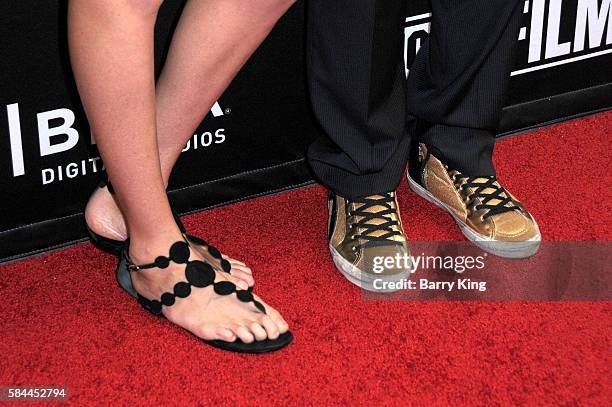 Olympian/professional beach volleyball player Kerri Walsh Jennings and husband professional beach volleyball player Casey Jennings, shoe detail,...