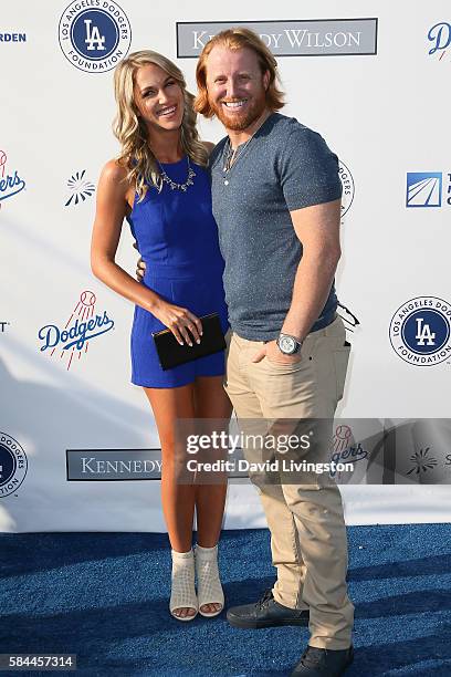 Kourtney Elizabeth and baseball third baseman Justin Turner arrive at the Los Angeles Dodgers Foundation Blue Diamond Gala at the Dodger Stadium on...