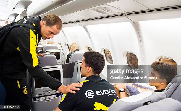 Manager Thomas Tuchel with Marc Bartra and Mikel Merino are ready for takeoff back to Germany after Borussia Dortmund's Asia Tour 2016 on July 29,...