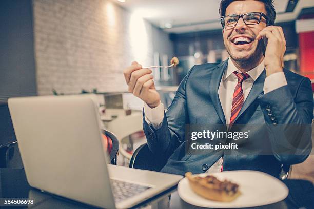 businessman in lunch break - business man laughing stock pictures, royalty-free photos & images