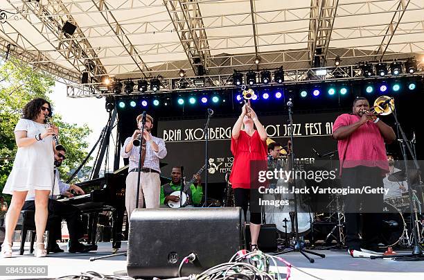 American musician Bria Skonberg plays trumpet as she leads her band, the NY Hot Jazz Festival All-Stars, during a performance at Central Park...