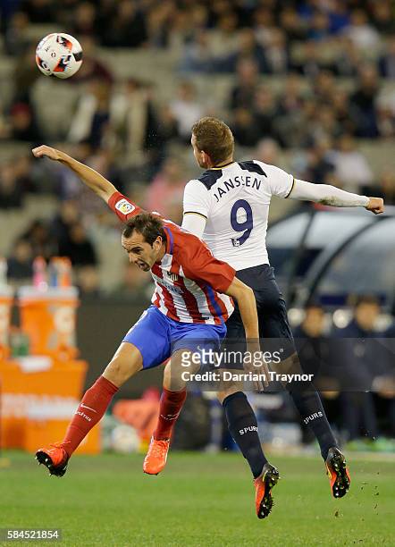 Diego Godn of Atletico Madrid and Vincent Janssen of Tottenham Hotspur compete for the ball during 2016 International Champions Cup Australia match...