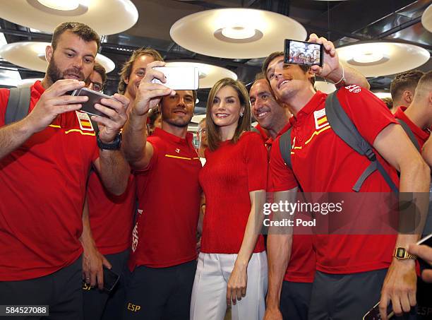 Queen Letizia Of Spain poses with the Spanish Olympic Team participants during the Olympics Games "RIO 2016" farewell at Adolfo Suarez Airport on...