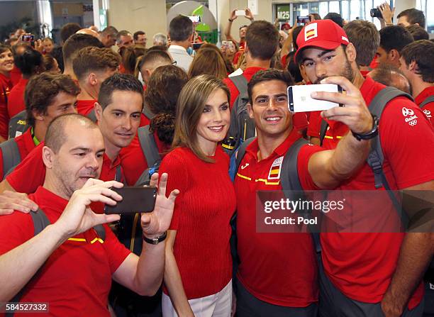 Queen Letizia Of Spain poses with the Spanish Olympic Team participants during the Olympics Games "RIO 2016" farewell at Adolfo Suarez Airport on...