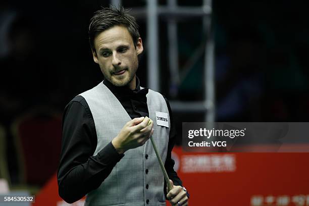 David Brown Gilbert of England chalks his cue in quarter finals against Neil Robertson of Australia on day five of World Open 2016 at the Number One...