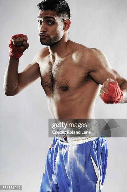 Professional boxer Amir Khan is photographed on May 18, 2011 in Bolton, England.