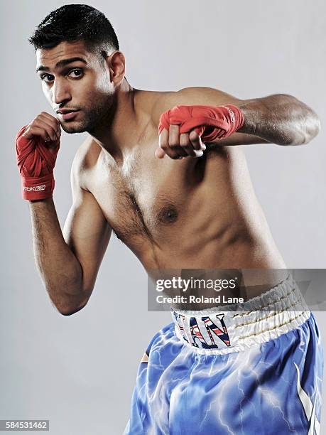 Professional boxer Amir Khan is photographed on May 18, 2011 in Bolton, England.