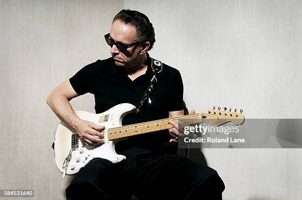 Blues rock guitarist and singer Jimmie Vaughan is photographed on June 4, 2010 in London, England.