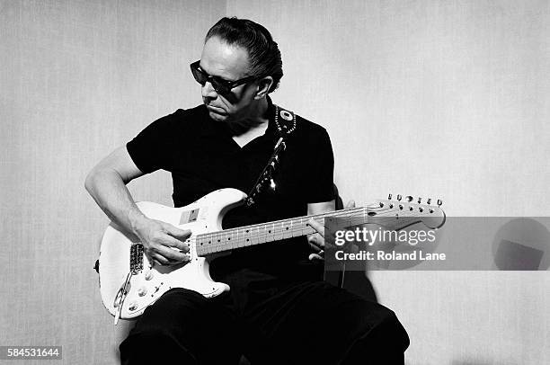 Blues rock guitarist and singer Jimmie Vaughan is photographed on June 4, 2010 in London, England.