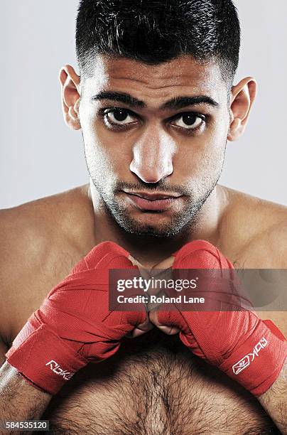 Professional boxer Amir Khan is photographed on May 18, 2011 in Bolton, England.