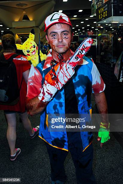 Cosplayer Shaylor Duranleau dressed as a Pokemon and Evil Dead mashup on day 1 of Comic-Con International 2016 at San Diego Convention Center on July...