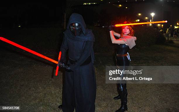 Cosplayers dressed as Kylo Ren from 'Star Wars: The Force Awakens' and Mara Jade on day 1 of Comic-Con International 2016 at San Diego Convention...