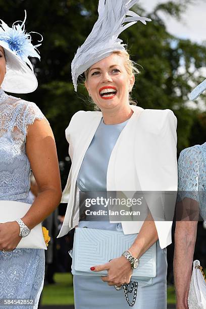 Guests attend the L'Ormarin best dressed competition at the Qatar Goodwood Festival 2016 at Goodwood on July 29, 2016 in Chichester, England.