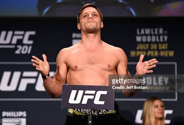 Michael Graves steps on the scale during the UFC 201 weigh-in at Fox Theatre on July 29, 2016 in Atlanta, Georgia.