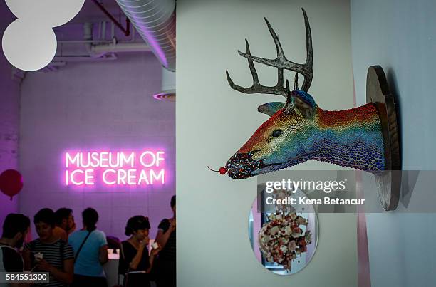 An installation called "Sundae Stag" by P.J. Linden is among ice cream-themed works of art previewed at the Museum of Ice Cream across from the...