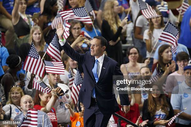 Josh Shapiro, Montgomery county commissioner and candidate for Pennsylvania attorney general, waves to the crowd before speaking at a campaign rally...