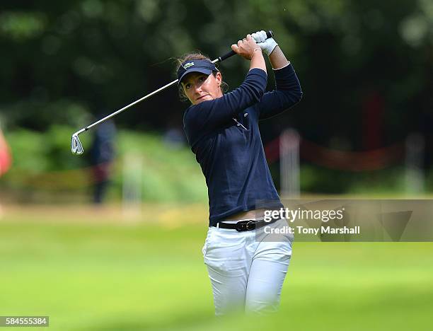 Gwladys Nocera of France plays her second shot on the 18th fairway during the Ricoh Women's British Open - Day Two at Woburn Golf Club on July 29,...