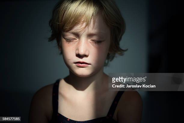 young girl with closed eyes - child eyes closed stock pictures, royalty-free photos & images