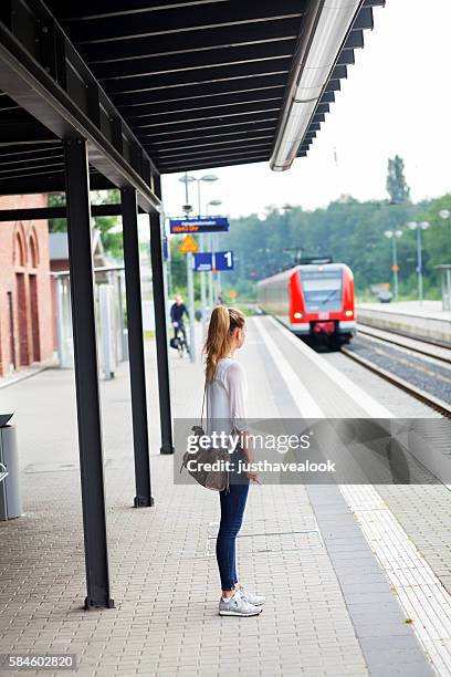 waiting for incoming s-bahn - deutsche bahn stock pictures, royalty-free photos & images