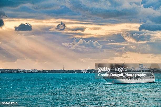 princess cruise ship arriving inking's wharf,  bermuda at dawn - cruise ship dock stock pictures, royalty-free photos & images