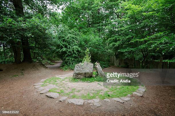 Forest of Paimpont, mythical forest of Broceliande, August 2014: Merlin's tomb . This is where Merlin was imprisoned deliberately and forever by the...