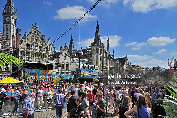 Street animation at the Korenlei during the Gentse Feesten / Ghent Festivities in summer, Belgium.
