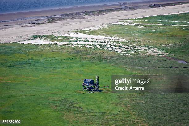Little hut on the Island of Trischen, uninhabited island in the Meldorf Bay, National Park Wadden Sea, North Frisia, Germany.