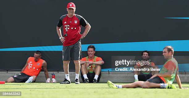 Team coach Carlo Ancelotti of FC Bayern Muenchen is pictured with his players Franck Ribery , Nicolas Feldhahn , Juan Bernat and Philipp Lahm a...