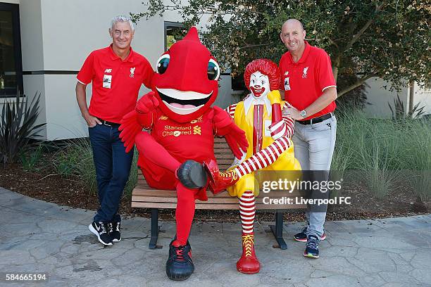 Former Liverpool players Gary McAllister and Ian Rush pose for a photo with Liverpool mascot Mighty Red while taking a tour of Ronald McDonald House...