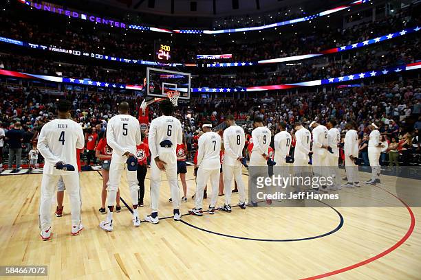 The USA Basketball Men's National Team stands for the national anthem before the game against Venezuela on July 29, 2016 at the United Center in...