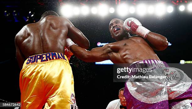 Thomas Williams Jr. Of the US. Punches Adonis Stevenson of Canadaduring their WBC light heavyweight championship fight at the Centre Videotron on...