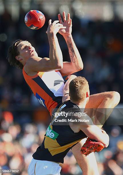 Rory Lobb of the Giants attempts to take a mark during the round 19 AFL match between the Greater Western Sydney Giants and the Richmond Tigers at...