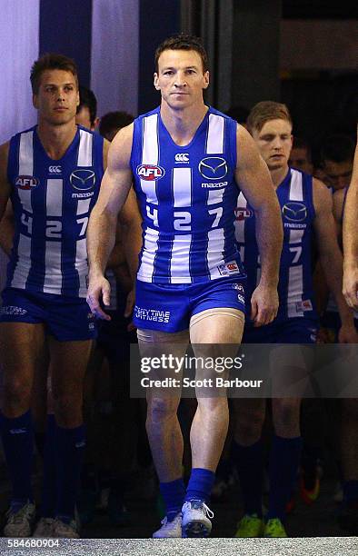 Brent Harvey of the Kangaroos runs out to play in the round 19 AFL match between the North Melbourne Kangaroos and the St Kilda Saints at Etihad...