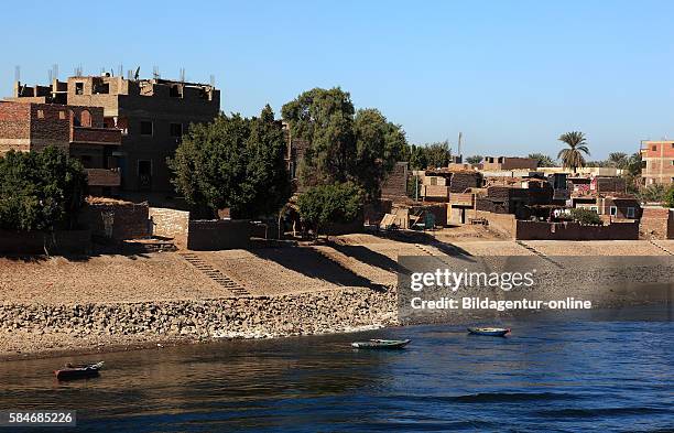View from the boat on the Nile to residential town Esna, Upper Egypt.
