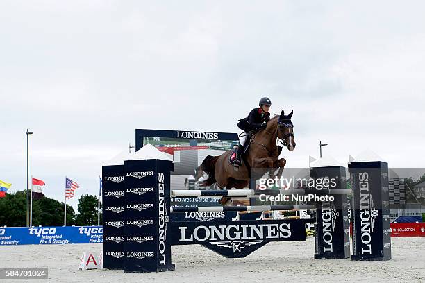 Carolina Aresu Garcia Obregon of Spain rides Grupo Prom Hashish during the Grand Prix Jumping CSI 4* at Casas Novas on July 29, 2016 in Arteixo,...