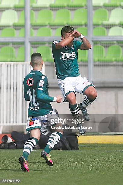 Javier Parraguez of Santiago Wanderers celebrates the first goal against Universidad de Chile during a match between Santiago Wanderers and...