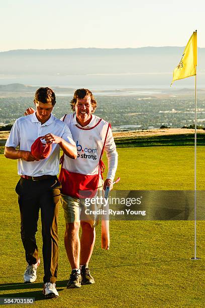 Maverick McNealy hugs his caddy and father Scott McNealy after finishing the second round of the Web.com Tour Ellie Mae Classic at TPC Stonebrae on...