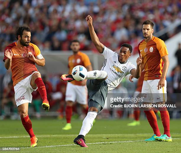 United's Anthony Martial controls the ball in front of Galatasaray's Selcuk Inan during the Galatasaray v Manchester United pre-season friendly...