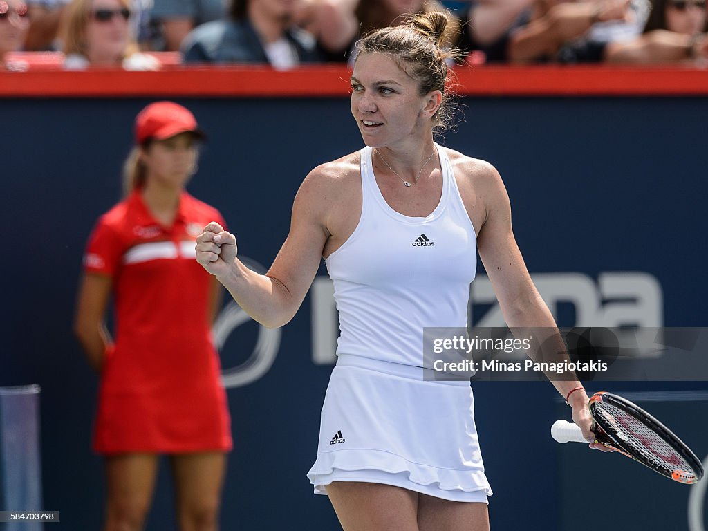 Simona Halep of Romania celebrates her victory over Angelique