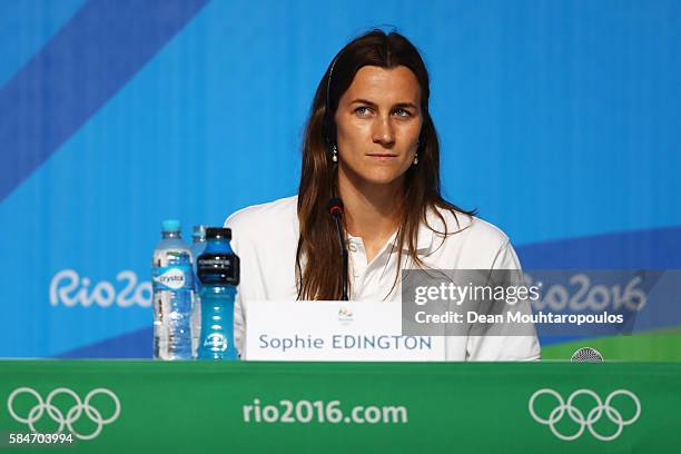 Sophie Edington speaks to the media at the Olympic Refugee Team Press Conference during the Olympics preview day - 6 at the Barra Olympic Park on...