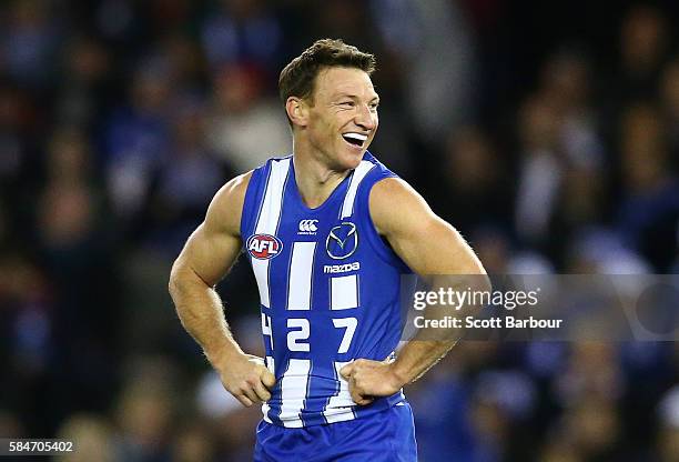 Brent Harvey of the Kangaroos smiles after kicking a goal during the round 19 AFL match between the North Melbourne Kangaroos and the St Kilda Saints...