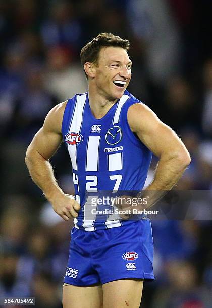 Brent Harvey of the Kangaroos smiles after kicking a goal during the round 19 AFL match between the North Melbourne Kangaroos and the St Kilda Saints...