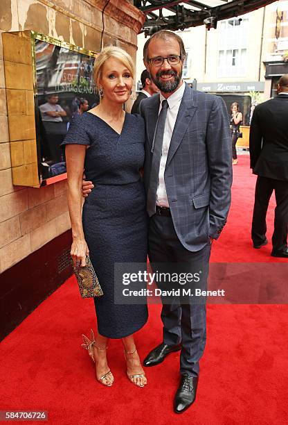 Rowling and Dr. Neil Murray attend the press preview of "Harry Potter & The Cursed Child" at The Palace Theatre on July 30, 2016 in London, England.