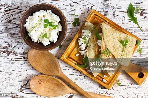 crepes with arugula and farmer cheese viewed from above, organic food - feta cheese stock pictures, royalty-free photos & images